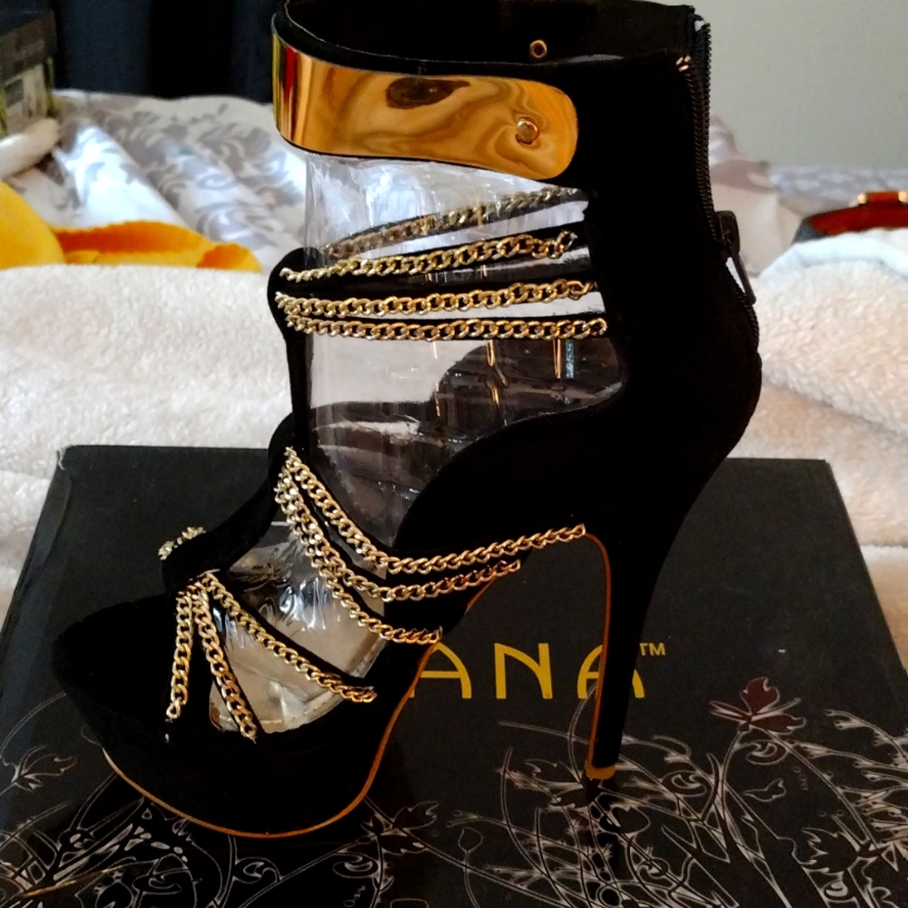Black and gold stiletto heels